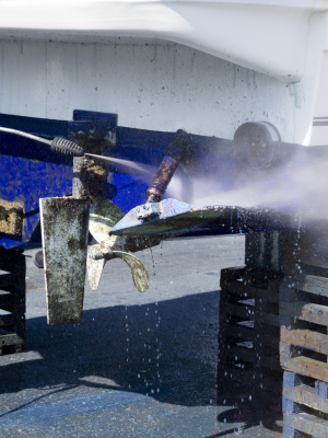 A boat having the prop cleaned.